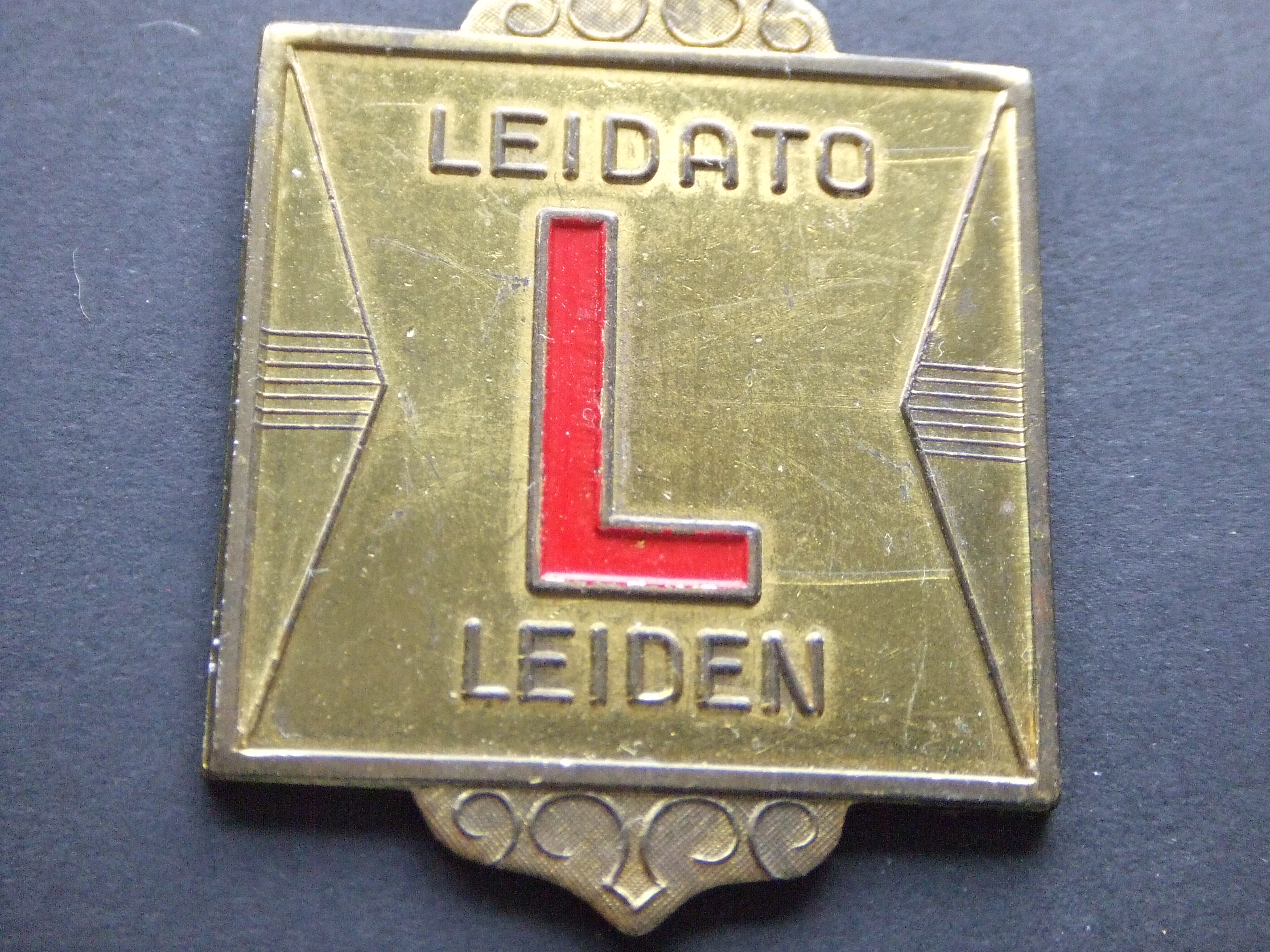 Leidato (Leidse Industrie, Detailhandel en Ambachts-tentoontstelling)huishoudbeurs. letter L